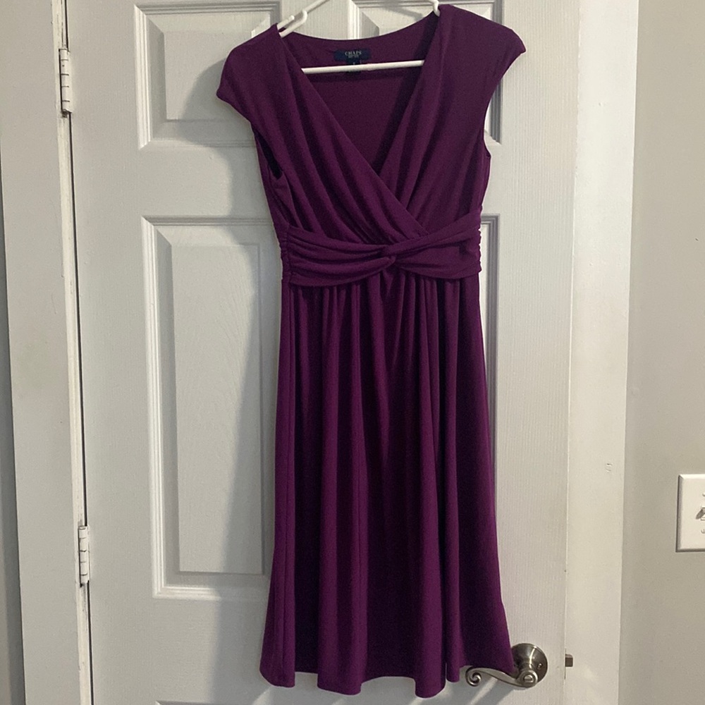 Lightweight women’s Small knee length purple/plumb dress with deep v neck.